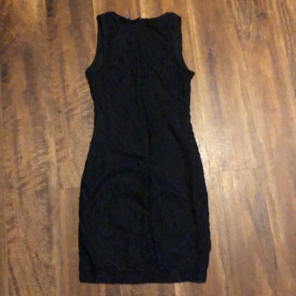 Barely worn, tight fitting, lace dress